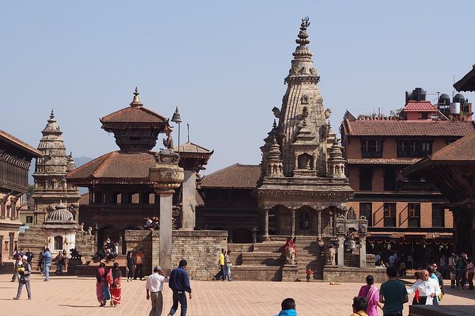 Kathmandu city tour - 4 UNESCO World Heritage Sites - Stop 3: Boudhanath Stupa, Prayer Wheels, and a Lunch Break