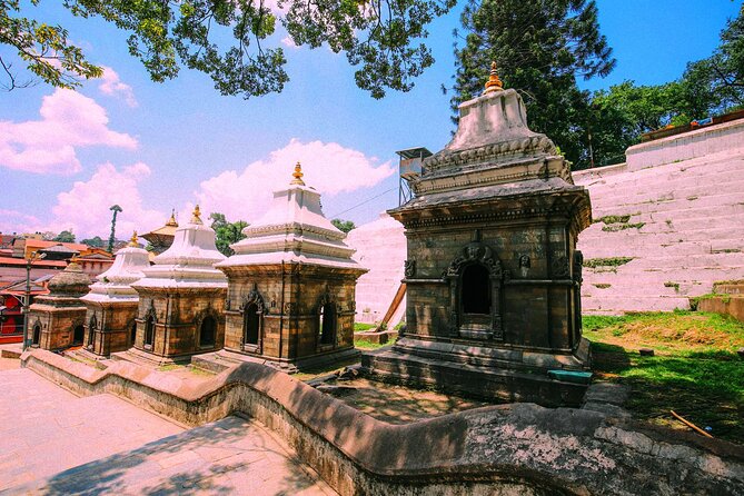 Pashupatinath Temple, Hindu Crematorium and Aarati in-depth Tour - Stop 3: Sandhya Aarati on the Bagmati river bank with priests and local crowds (2 hours)