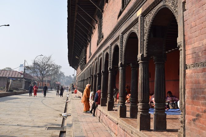 Seven World Heritage Day Tour in Kathmandu Nepal - Stop 6: Golden Temple (Hiranya Varna Mahavihar)—pagoda form with metallic details